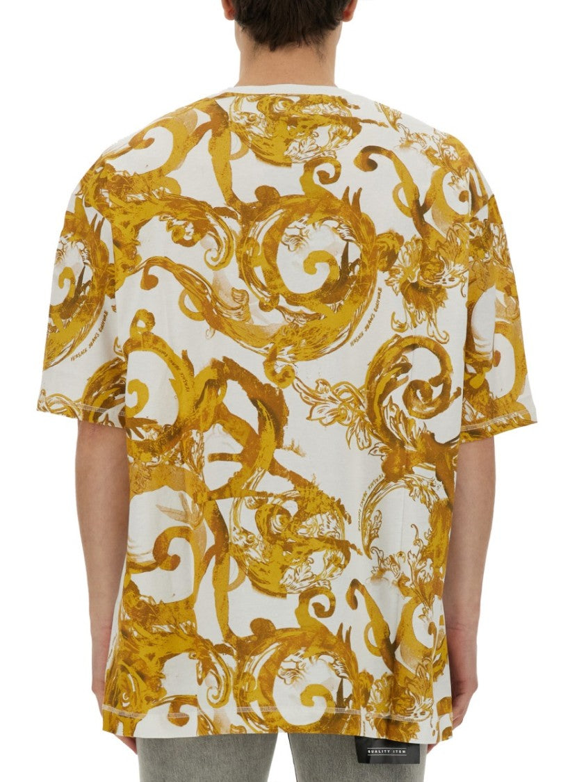 Oversized T-Shirt With Bold Logo And Intricate Patterned Sleeves