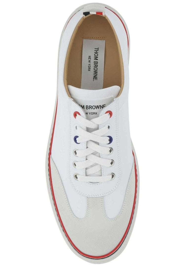 Low-Top White Leather Sneakers with Suede Accents and Signature Detailing