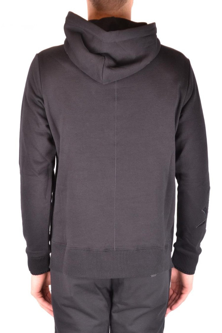 Black Hoodie With Bold Embossed Skull Design