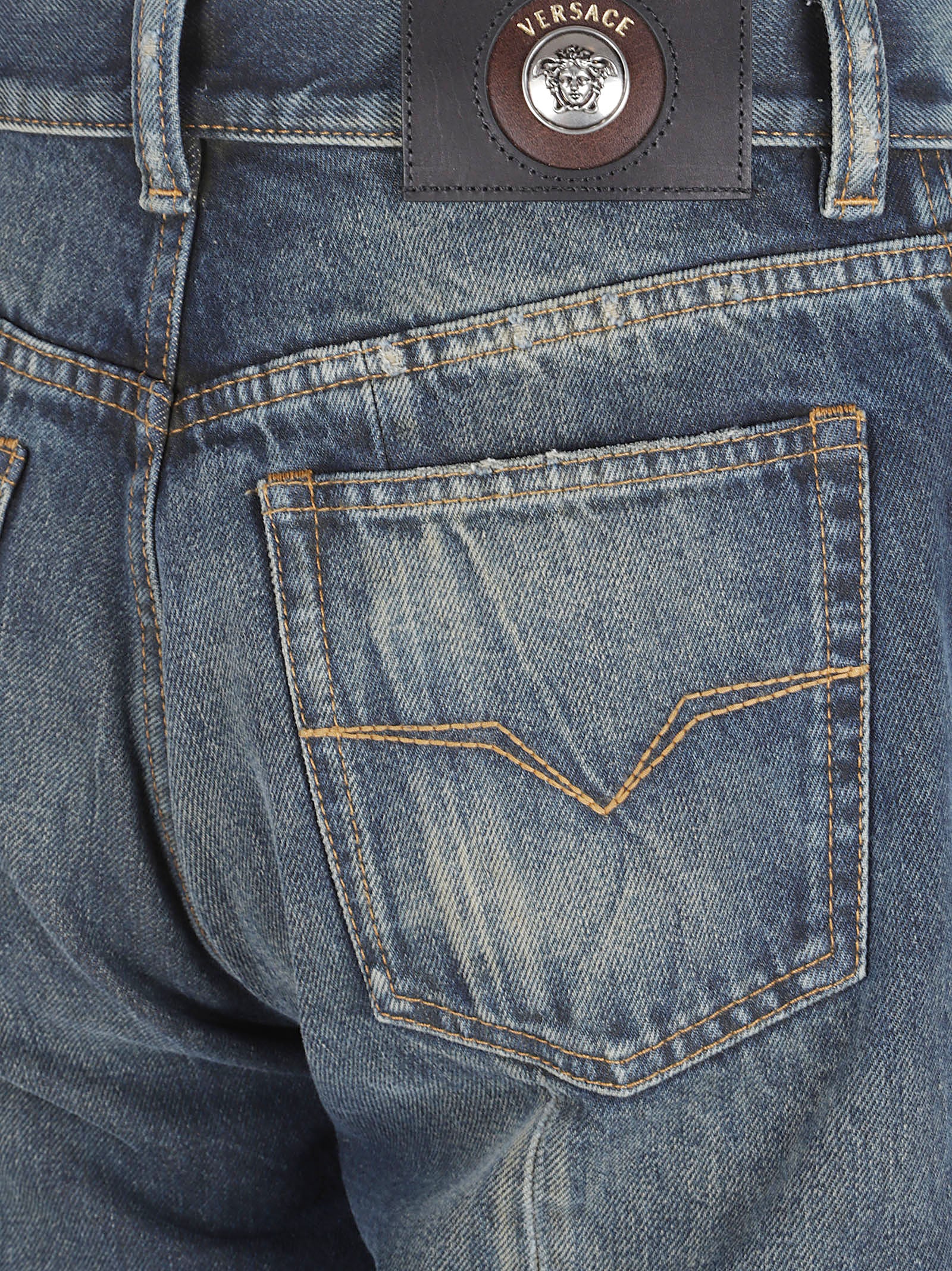 Distressed Blue Denim Straight-Leg Jeans with Medusa Emblem