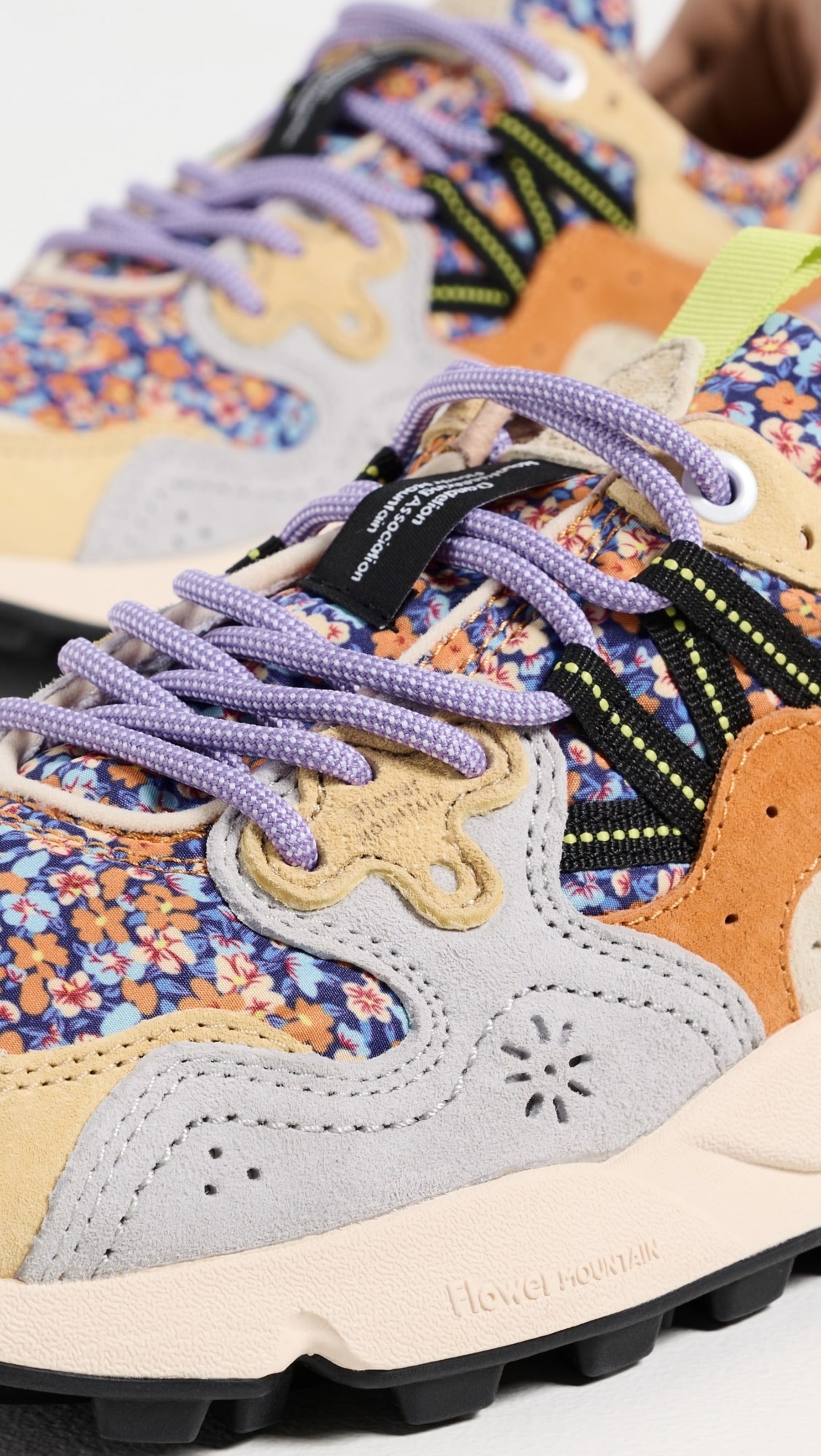 Floral-Patterned Sneakers with Suede Overlays and Innovative Textures