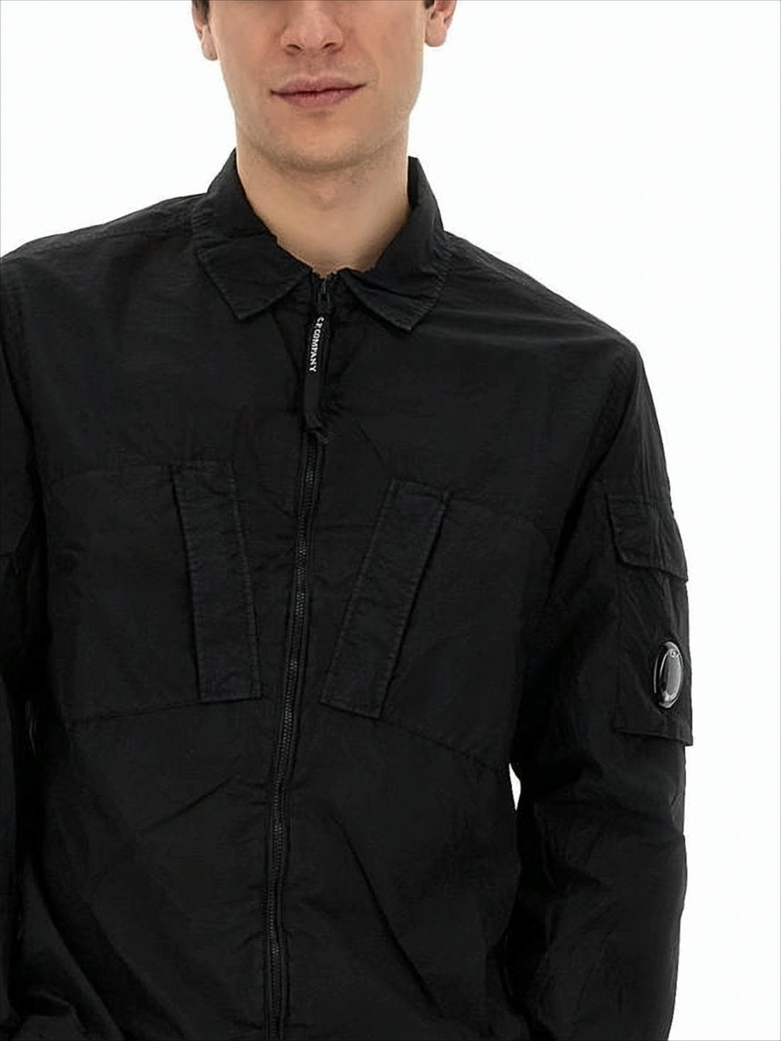 Minimalist Black Polyamide Jacket With Innovative Design Elements