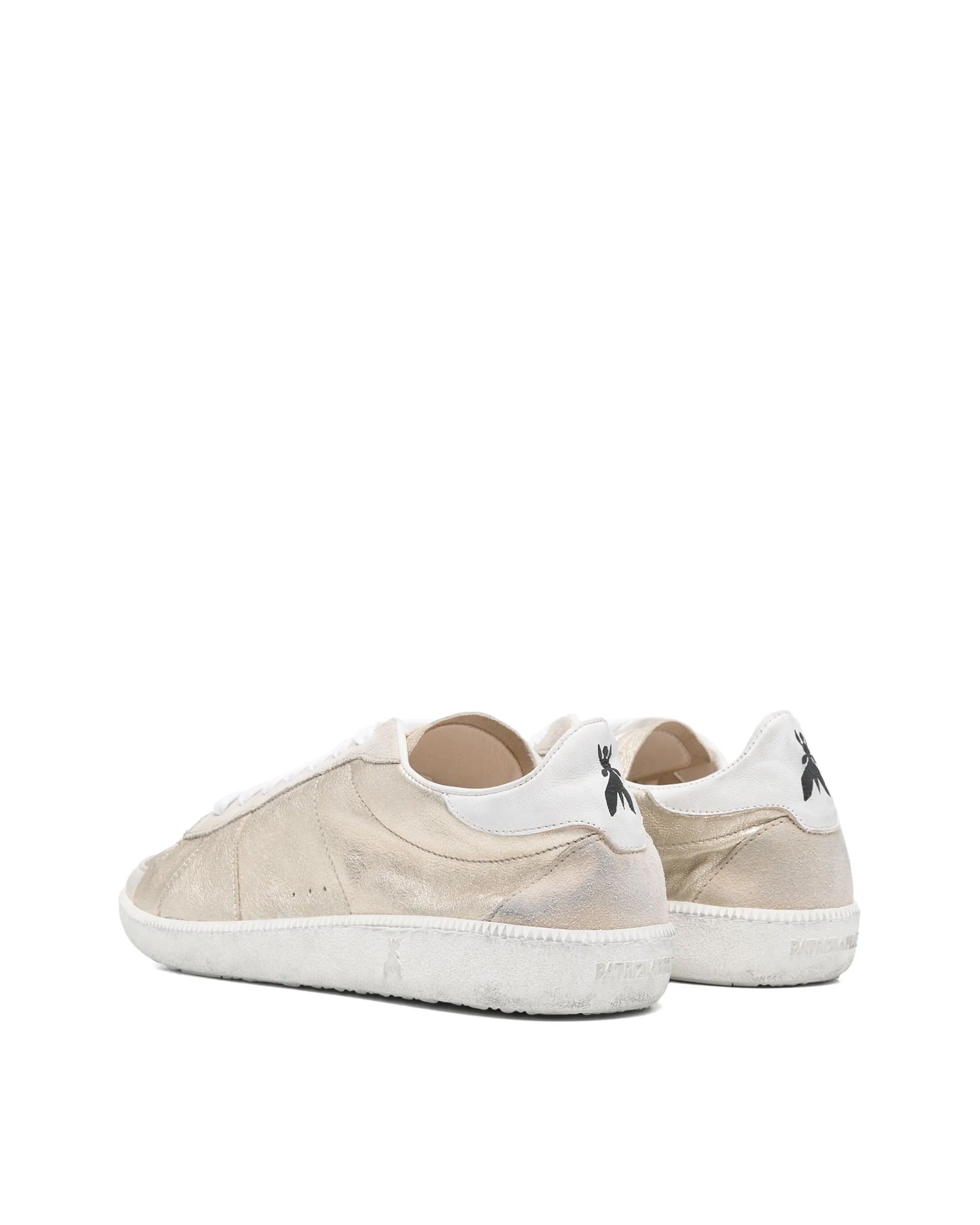 Błyszczące złote sneakersy Skin ’93