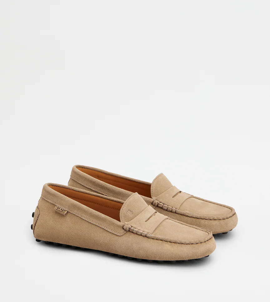 Classic Brown Leather Moccasins With Distinctive Detailing
