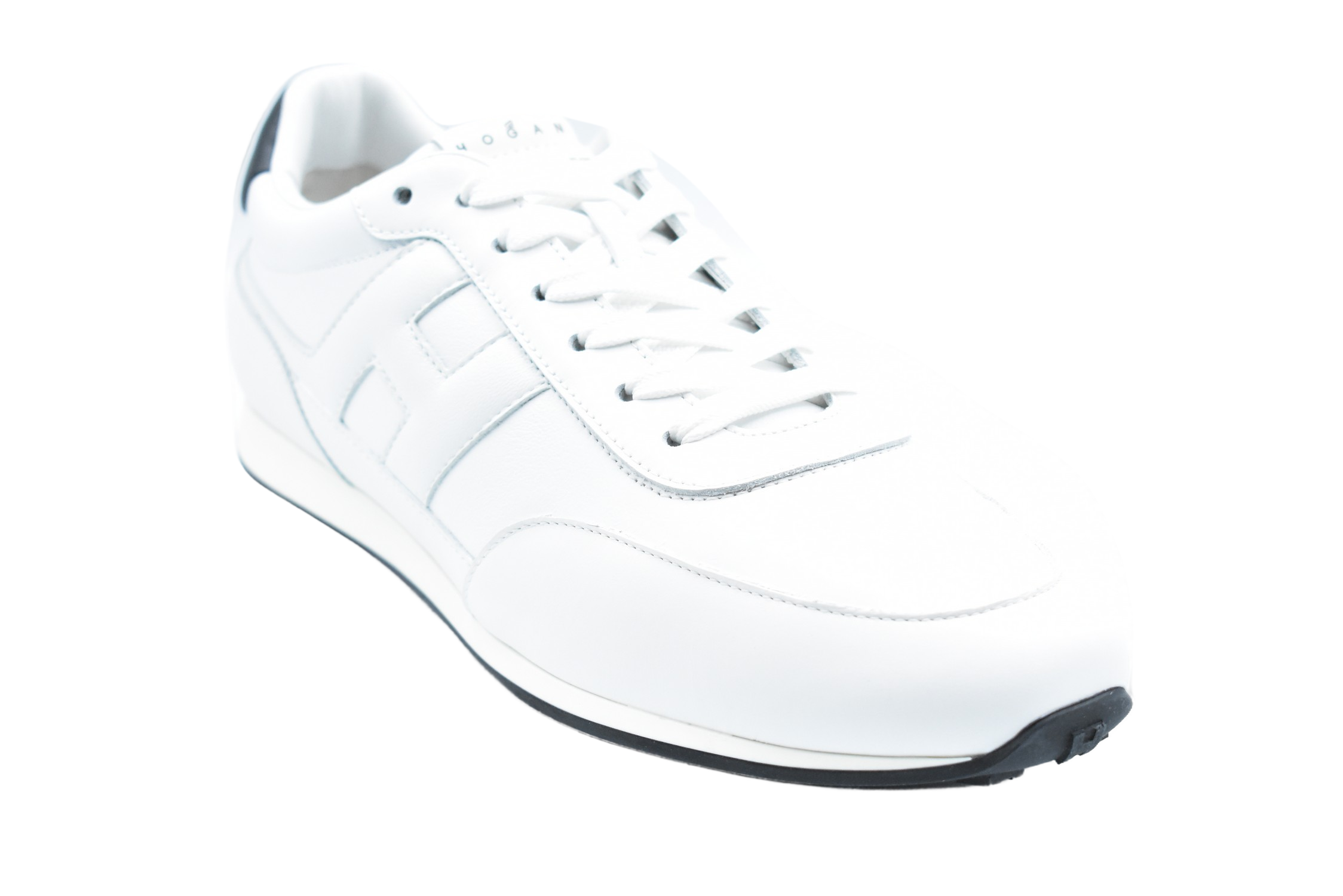 Vintage-Inspired White Sneakers With H-Stud Details