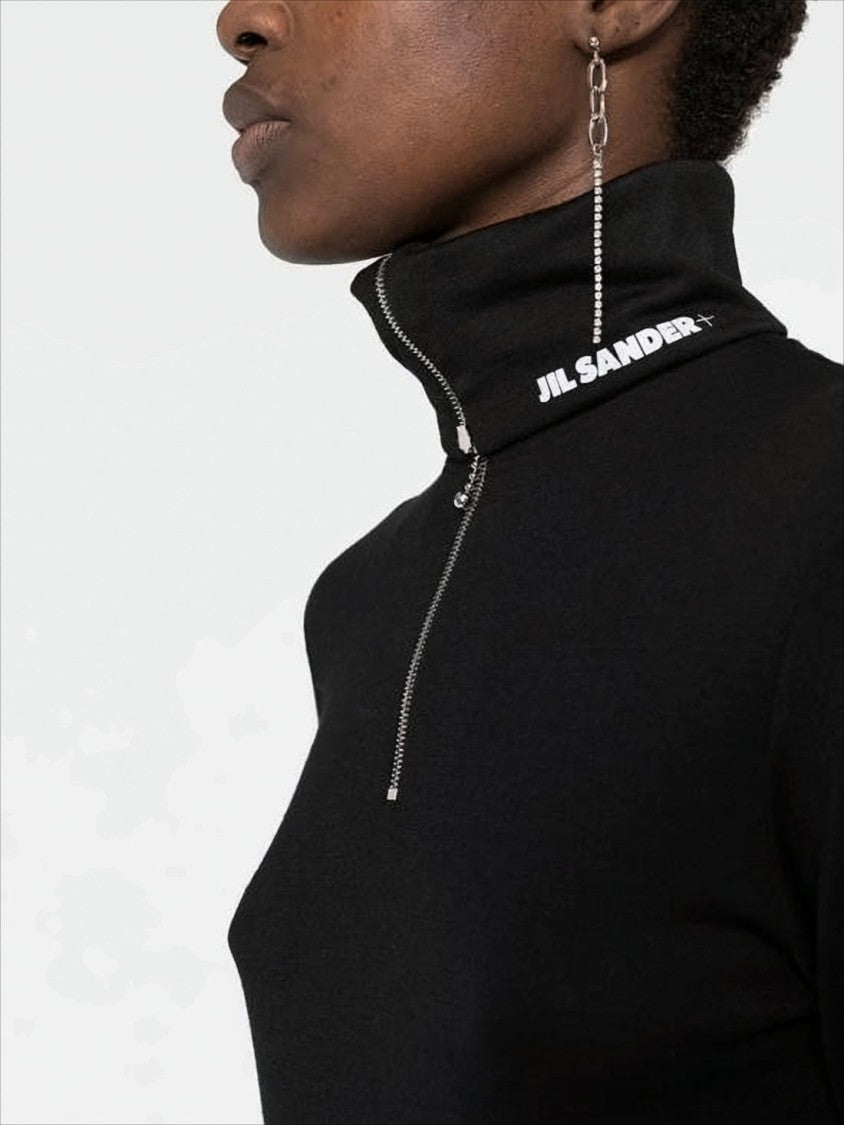 Fitted Turtleneck with Half-Zip Closure and Subtle Branding