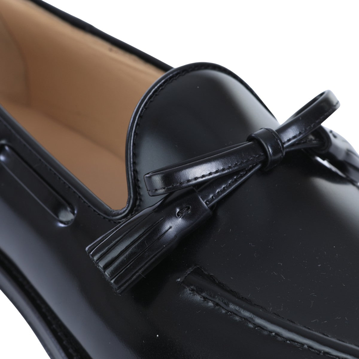 Polished Black Leather Loafers with Decorative Tassels