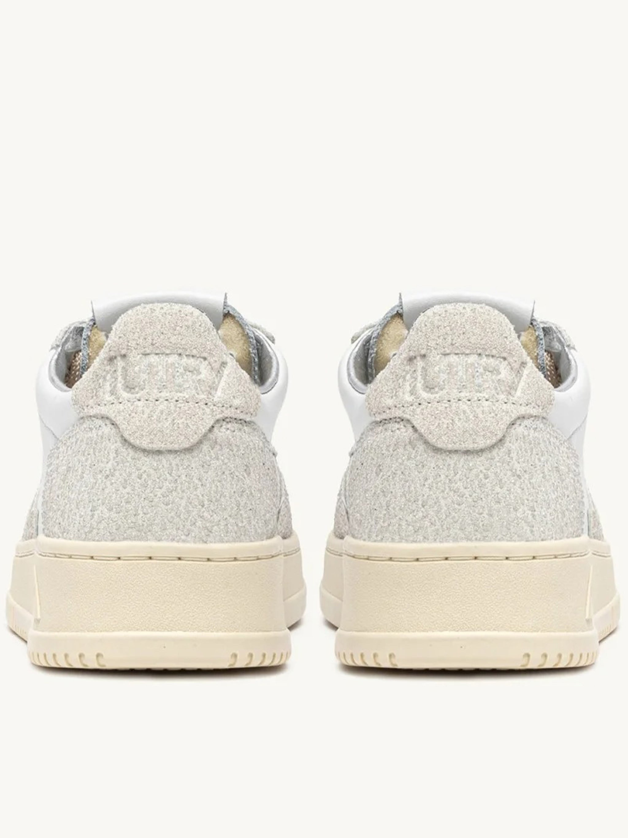 Low-Top Sneakers With Perforated Detailing And Vintage Aesthetic