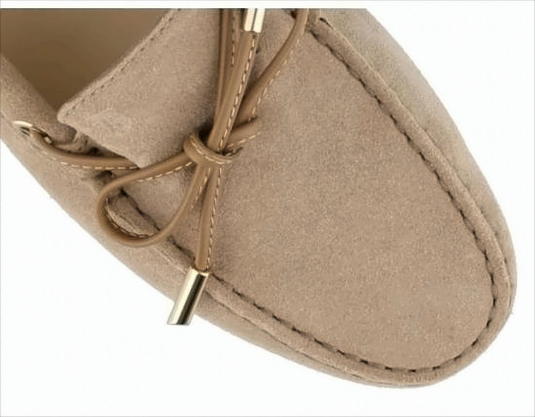 Classic Suede Loafer with Decorative Bow and Signature Pebbled Sole