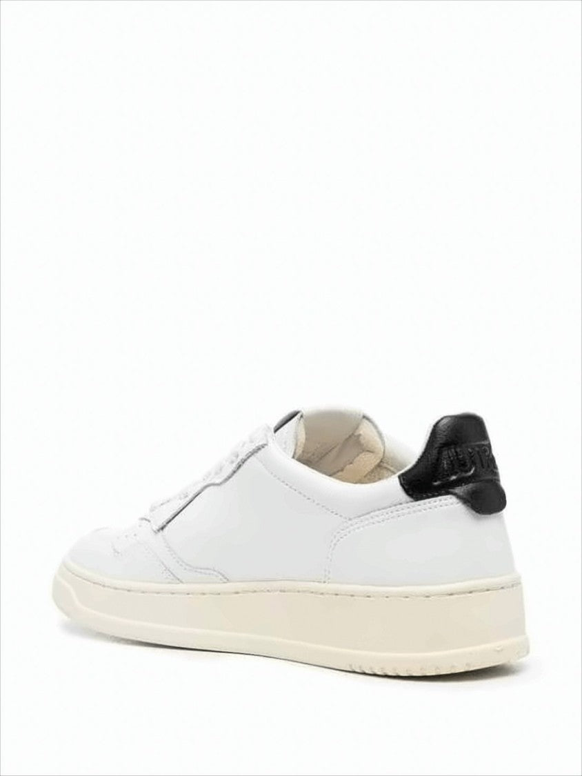 Low-Top White Leather Sneakers with Perforated Detailing