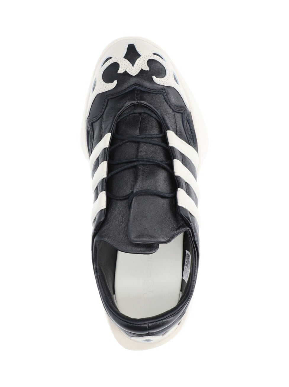 Black Leather Sneakers With Cream Accents And Iconic Stripes