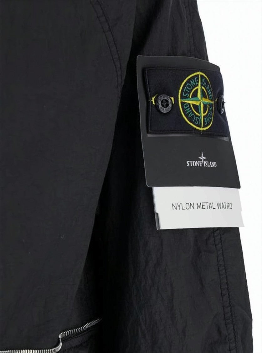 Black Lightweight Hooded Jacket with Reflective Piping and Distinctive Patch