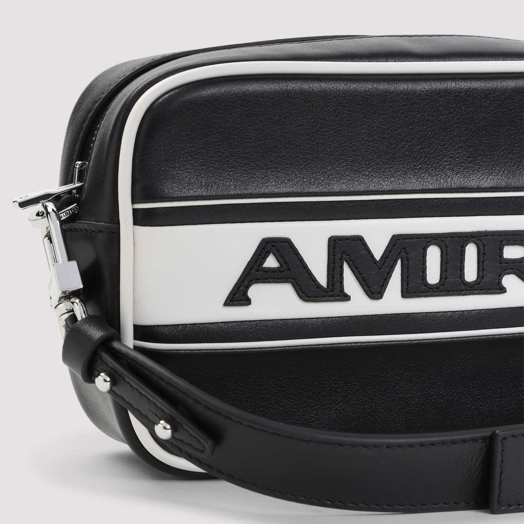 Compact Black Leather Shoulder Bag With White Accents And Bold Logo