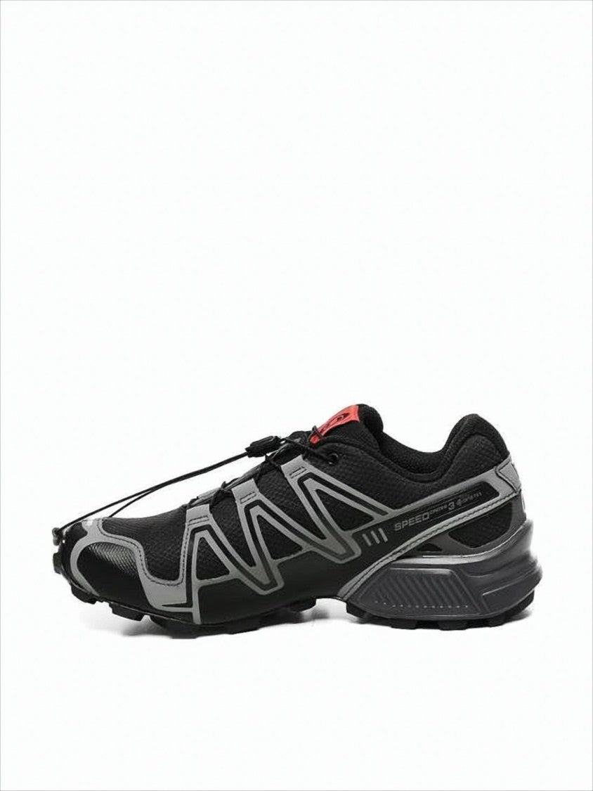 Athletic Sneakers with Streamlined Silhouette and Unique Overlays