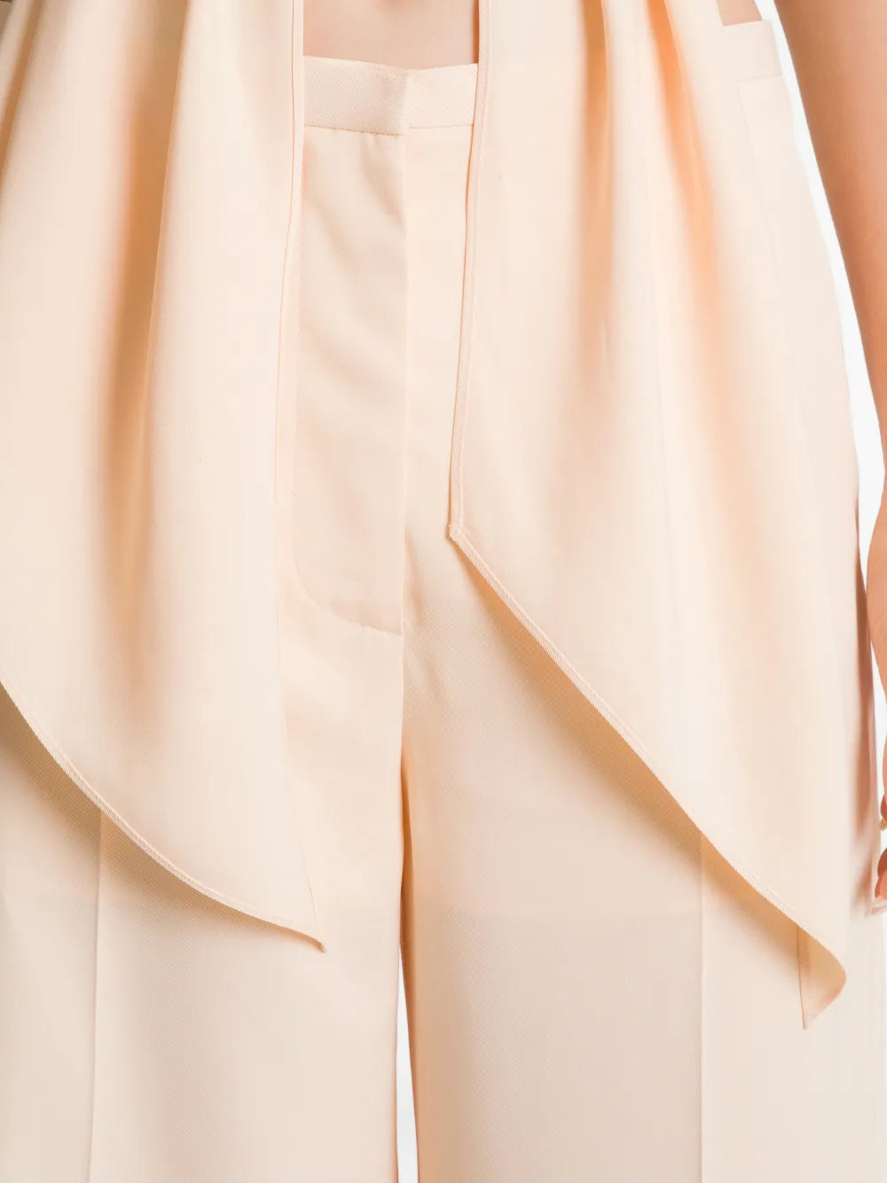 Sleeveless Halter Neck Top with Deep V-Neck and Draped Hem