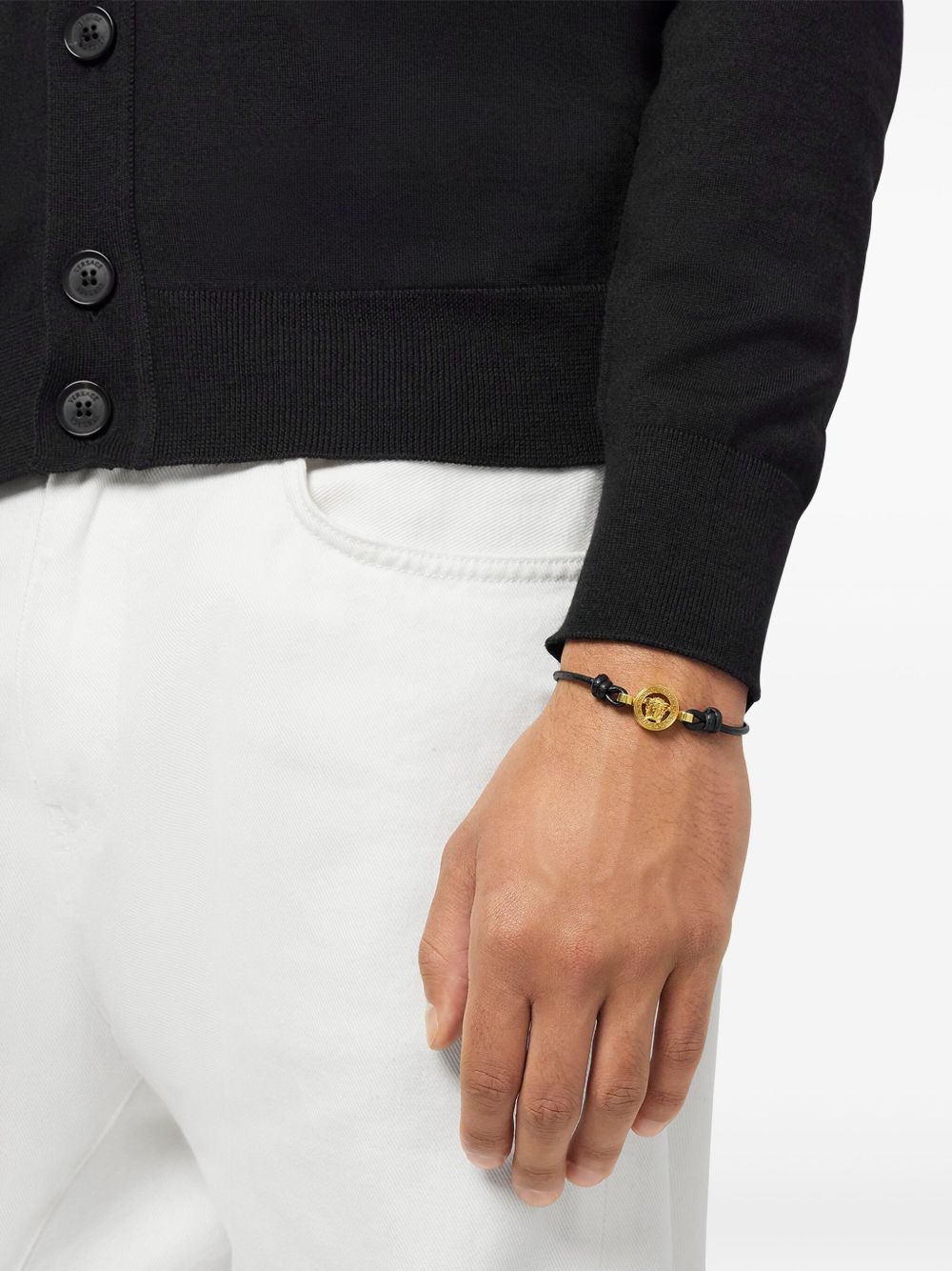 Polished Gold-Tone Medusa Head Bracelet With Adjustable Black Cord