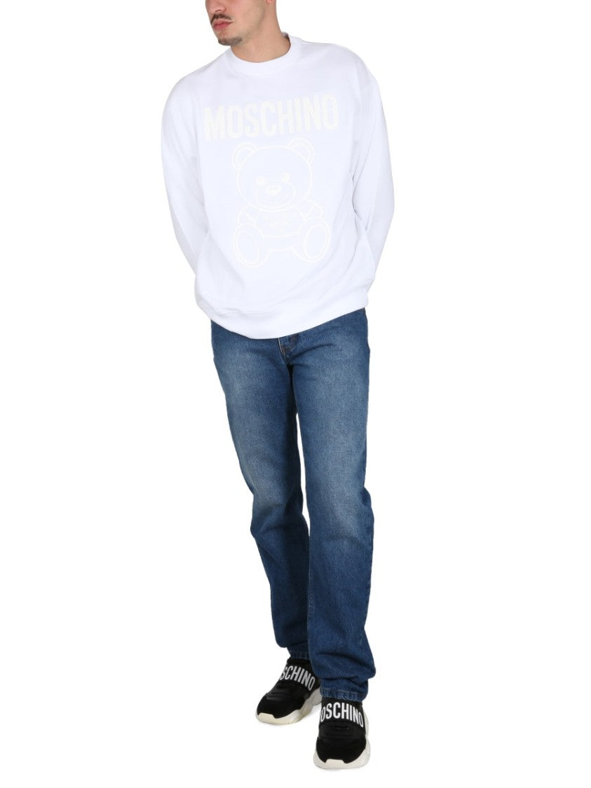 Cross-Neck White Sweatshirt With Playful Teddy Bear Graphic