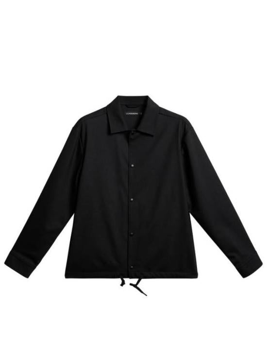 Minimalist Black Jacket With Adjustable Hem And Button-Up Front