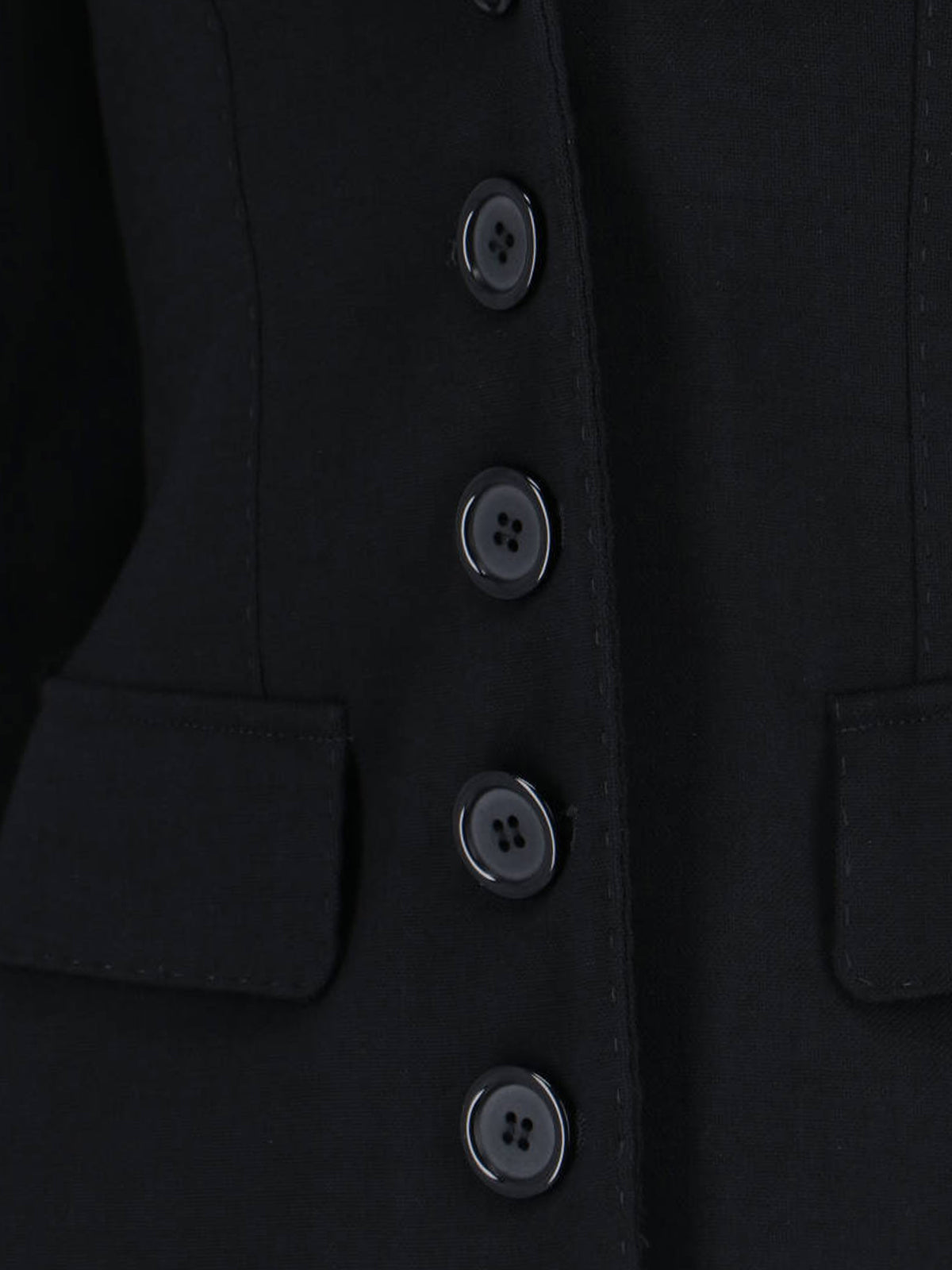 Tailored Black Jacket With Structured Shoulders And Minimalist Design