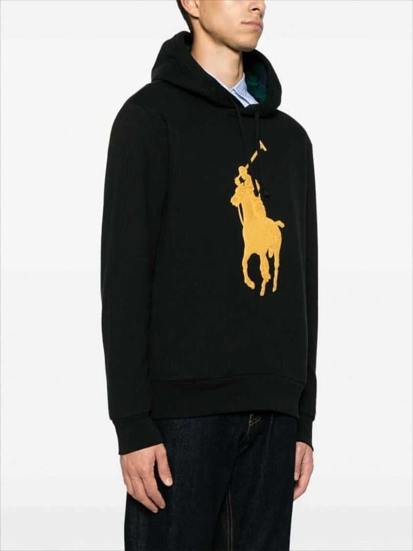 Black Hoodie with Bold Yellow Polo Graphic and Plaid Lining