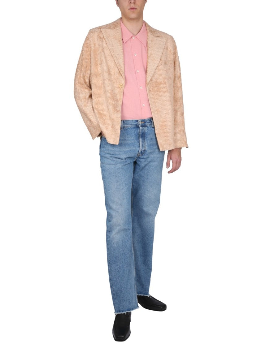 Light-Wash Jeans With Distressed Hem