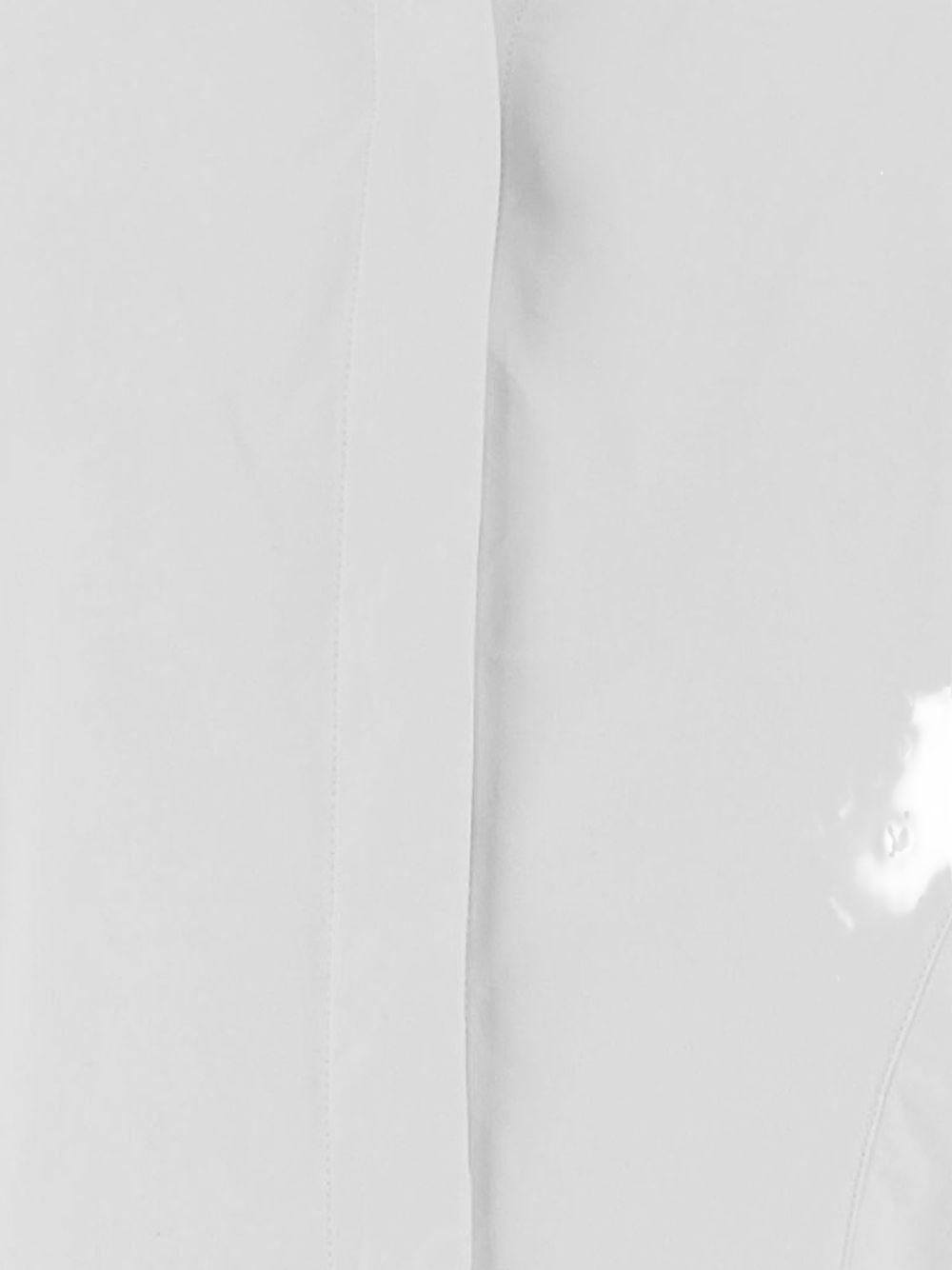 Structured White Top with Deep V-Neckline