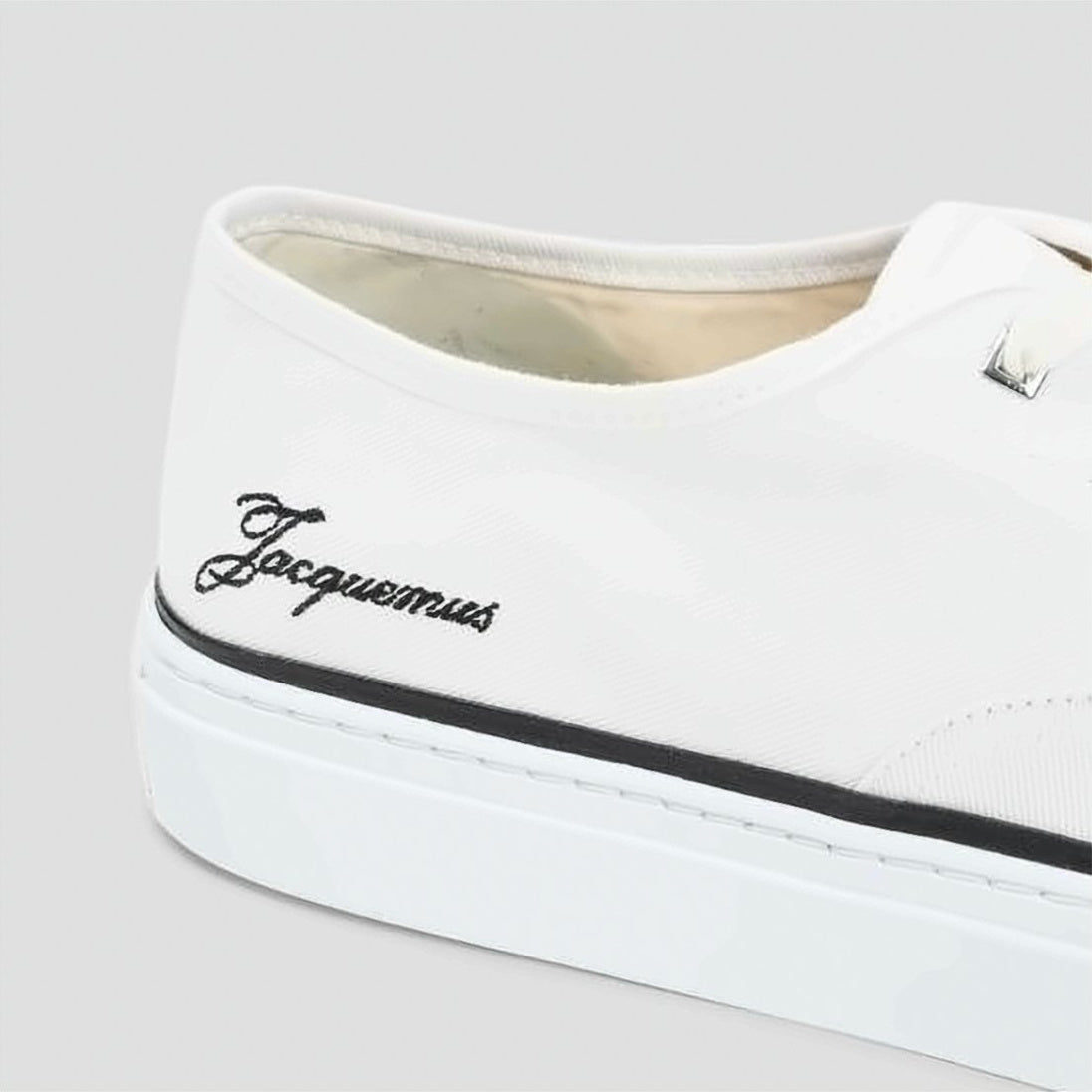 Minimalist White Sneakers with Elegant Black Detailing