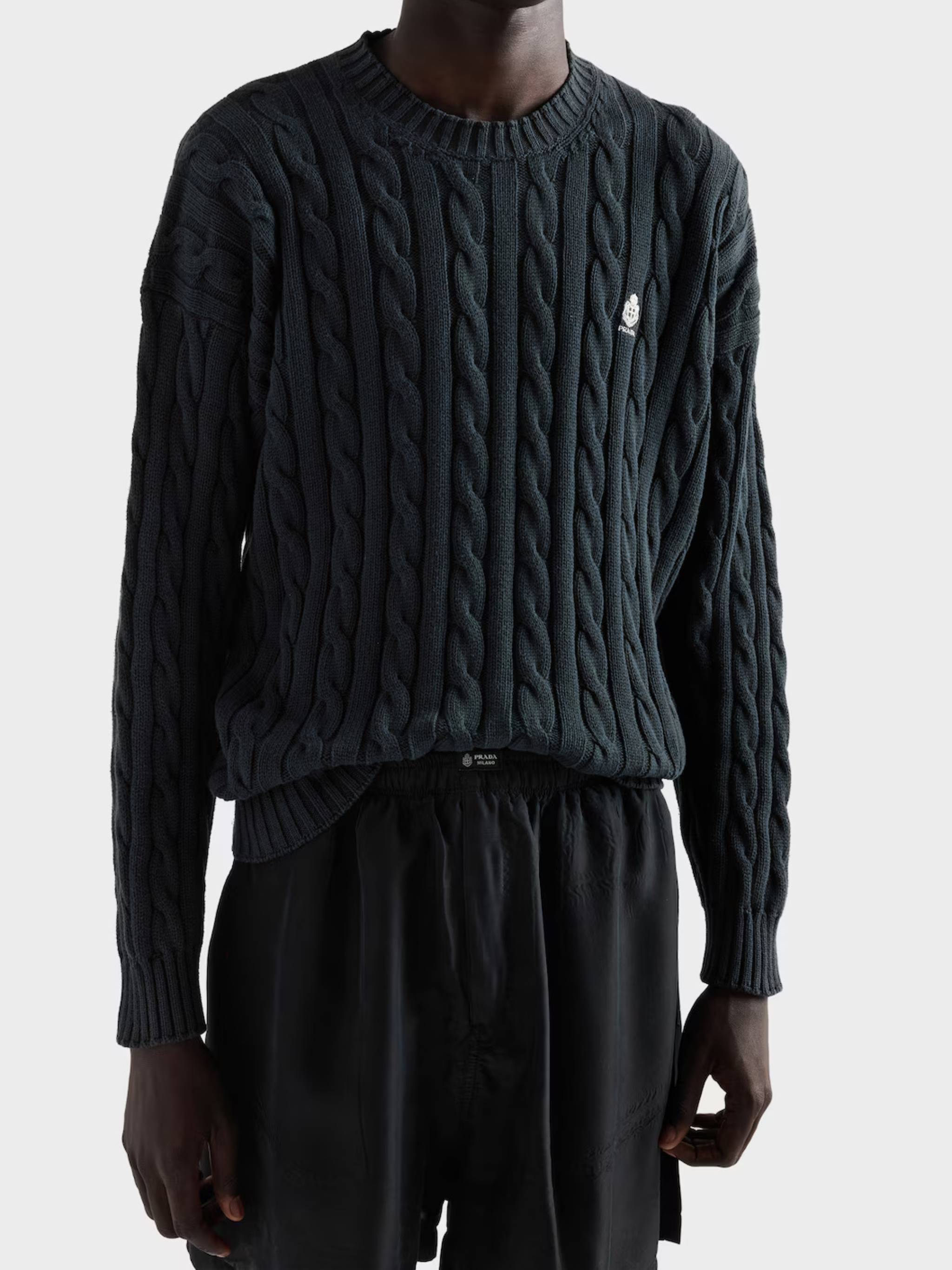 Cable-Knit Sweater with Classic Crew Neckline and Braided Textures