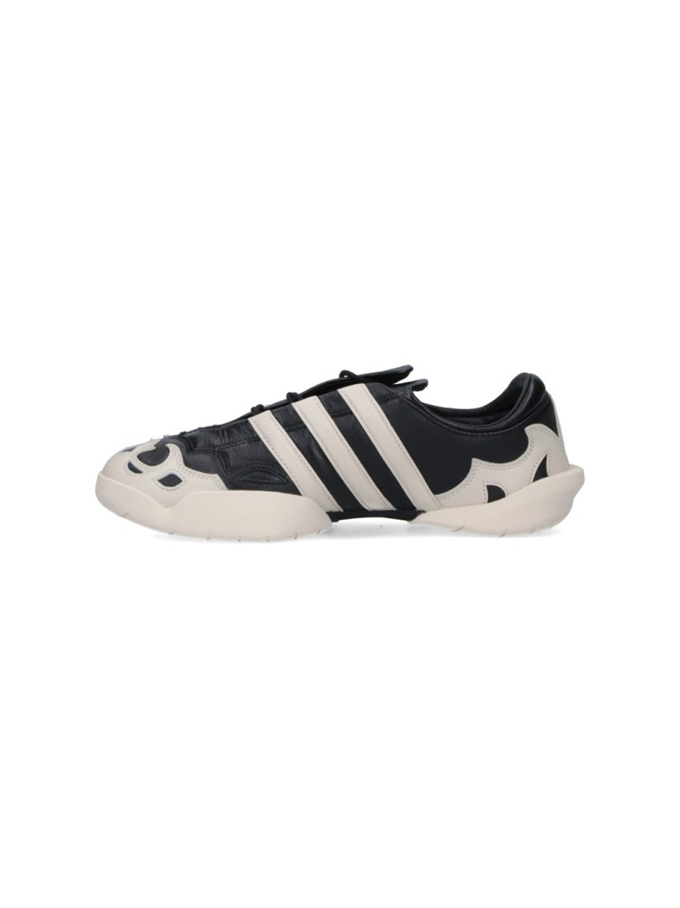 Black Leather Sneakers With Cream Accents And Iconic Stripes