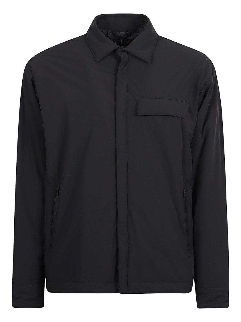 Minimalist Jacket With Concealed Closure And Adjustable Cuffs