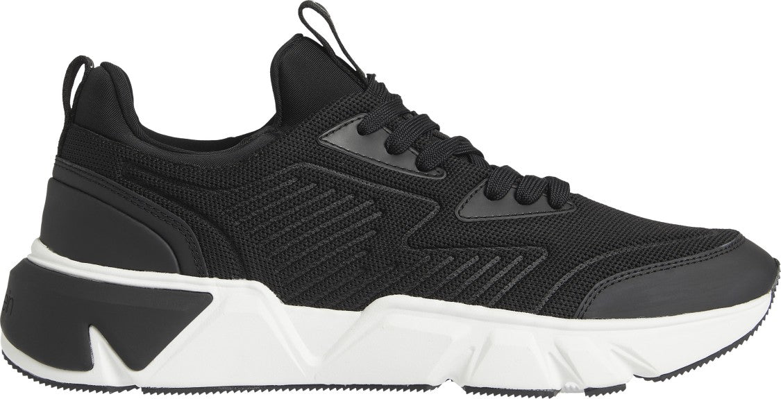 Black Sneakers With Textured Upper And Rubber Sole