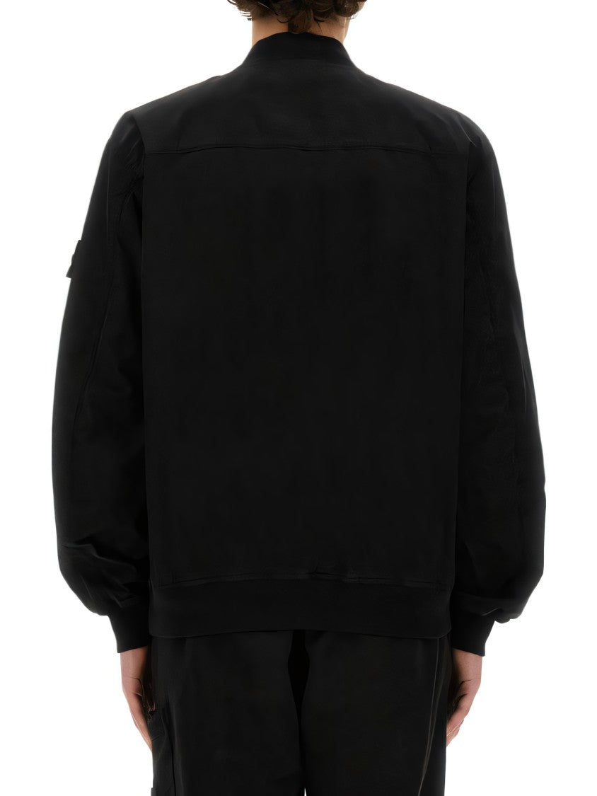 Black Jacket With Zip Closure And Fitted Cuffs