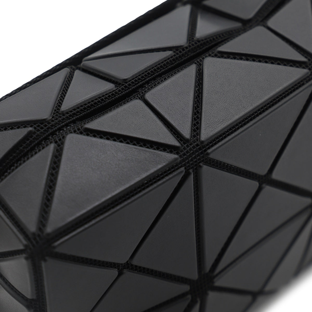 Geometric Black Bag with Faceted Surface
