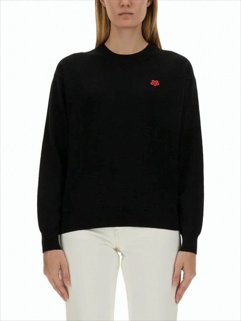 Classic Black Wool Sweater With Ribbed Cuffs And Subtle Detail