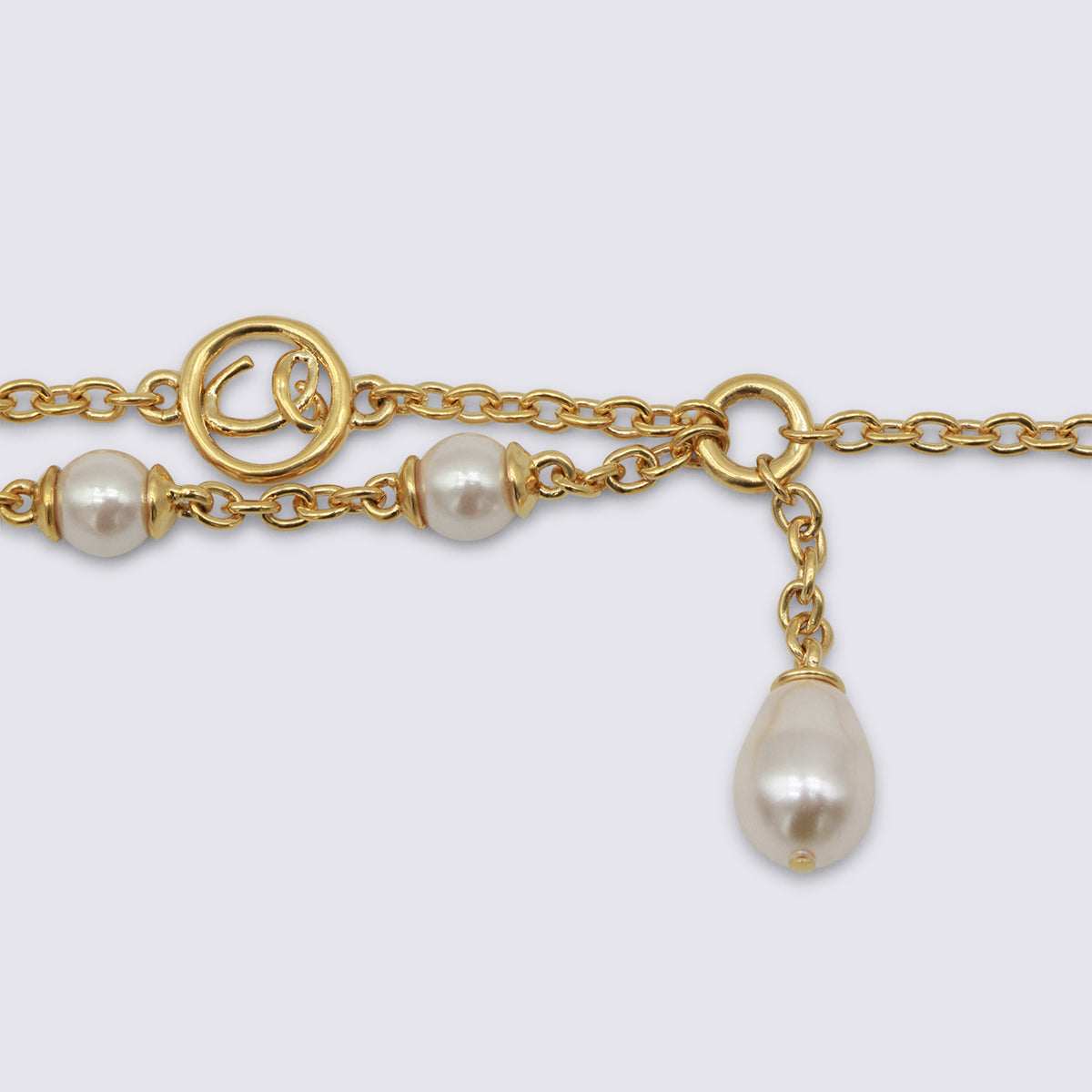 Gold And Pearly Bras Bracelet