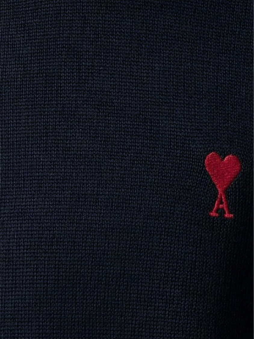 Classic Crewneck Wool Sweater with Subtle Heart Emblem
