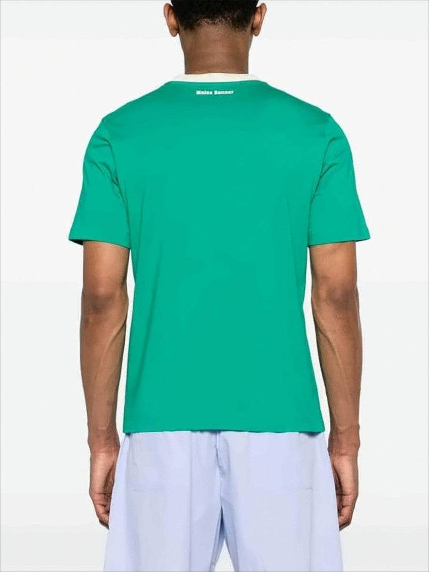 Green Graphic Tee with Leopard and Script Design