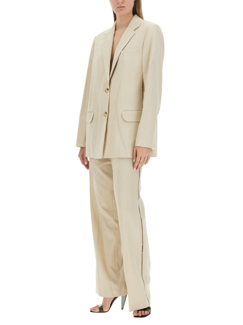 Tailored Jacket With Notched Lapel And Distinctive Logo