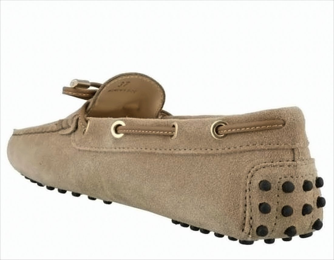 Classic Suede Loafer with Decorative Bow and Signature Pebbled Sole