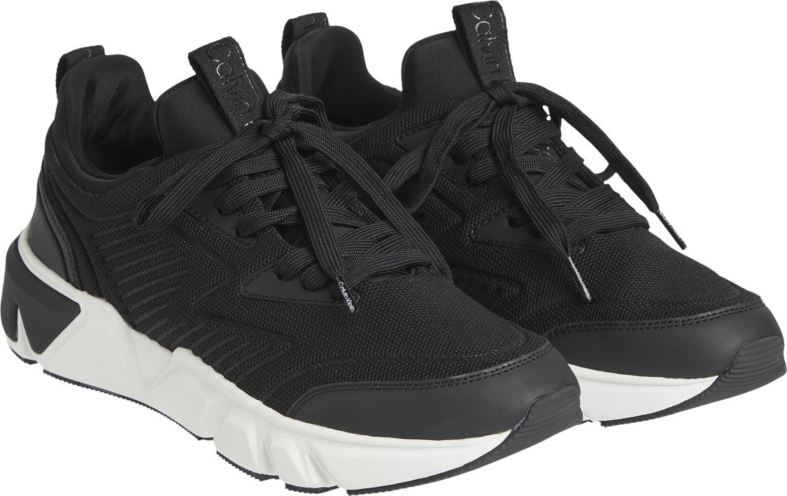 Black Sneakers With Textured Upper And Rubber Sole