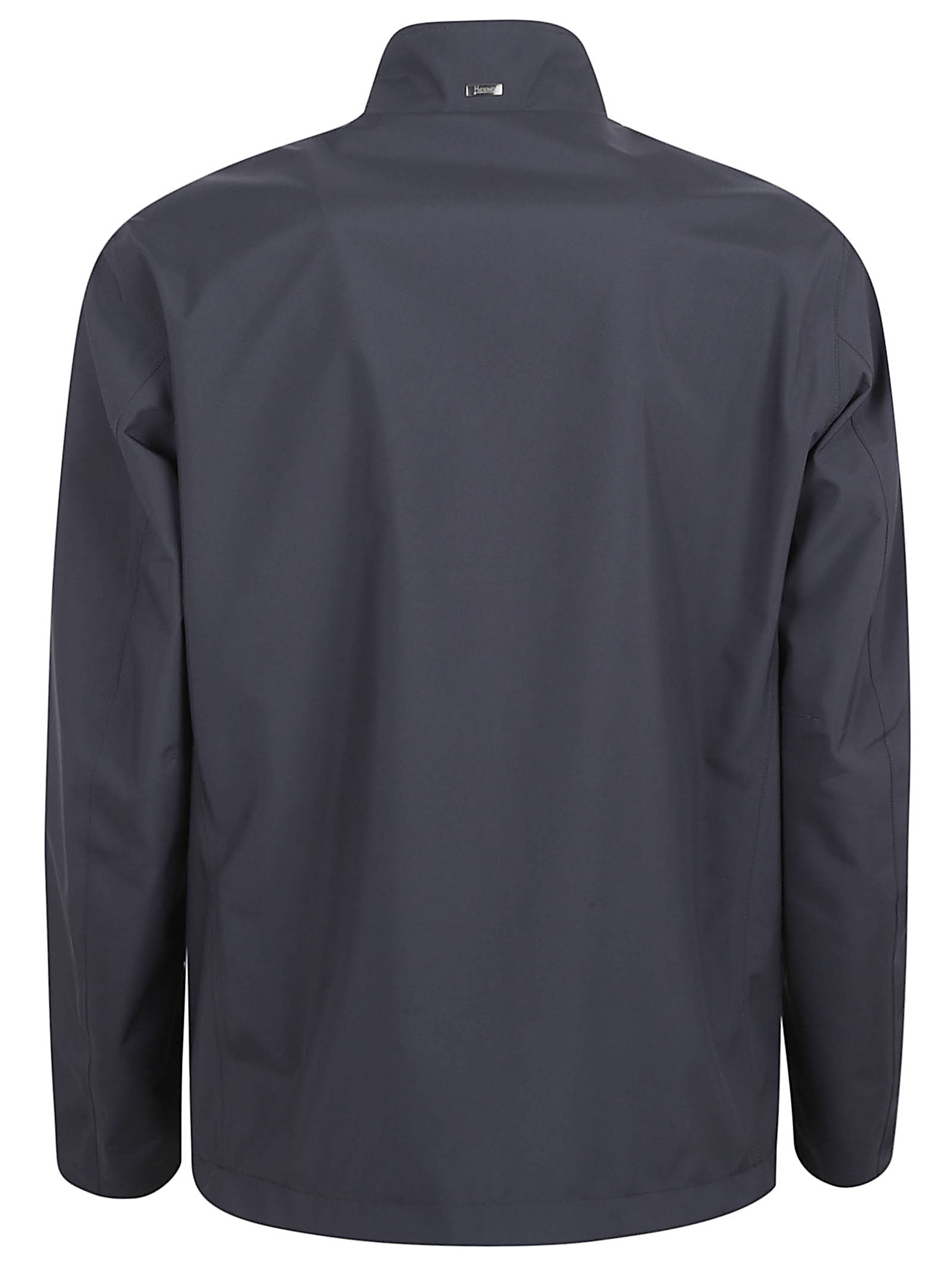 Blue Jacket with High Collar and Concealed Closure