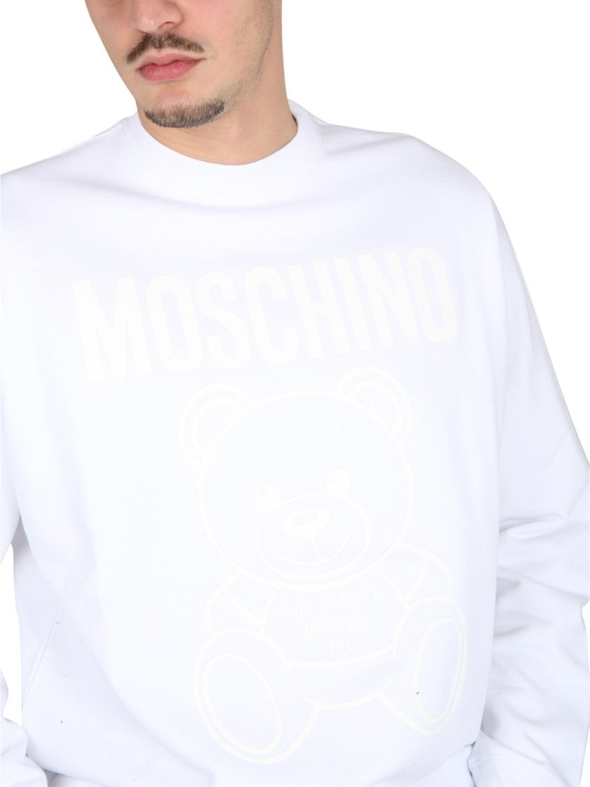 Cross-Neck White Sweatshirt With Playful Teddy Bear Graphic