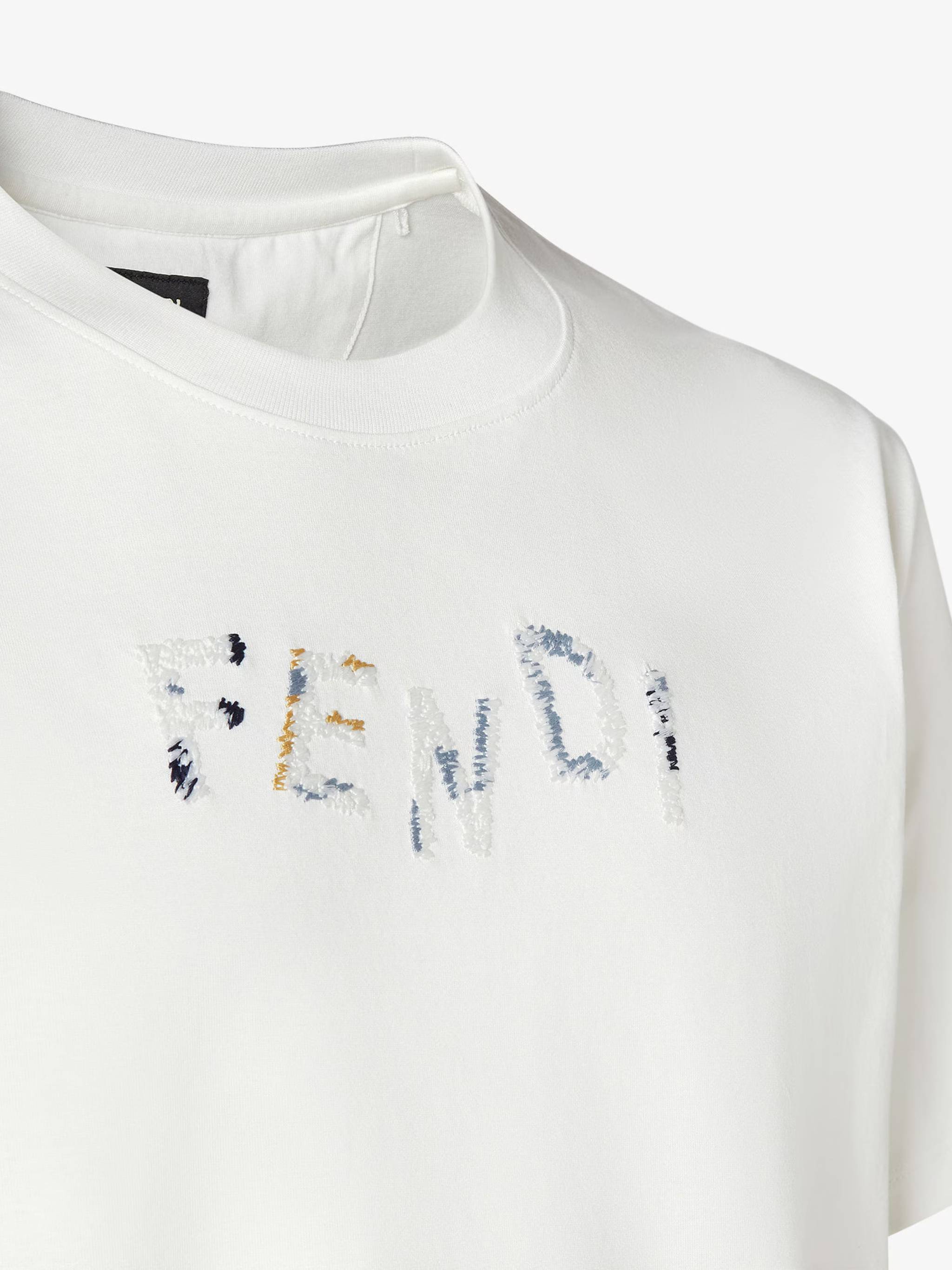Short-Sleeved Crew Neck T-Shirt with Distressed Text Design