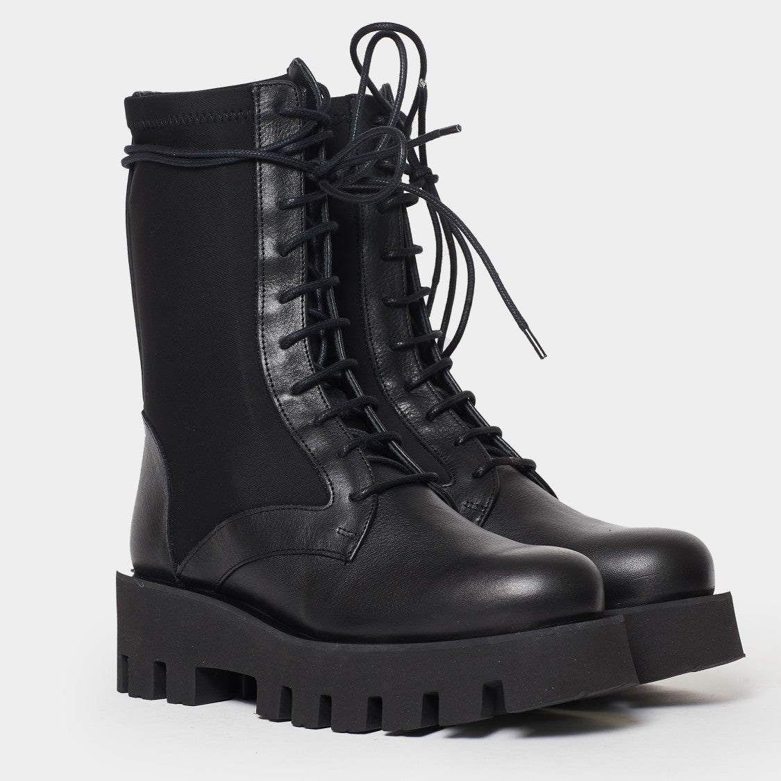 Neoprene-Accented Black Leather Ankle Boots