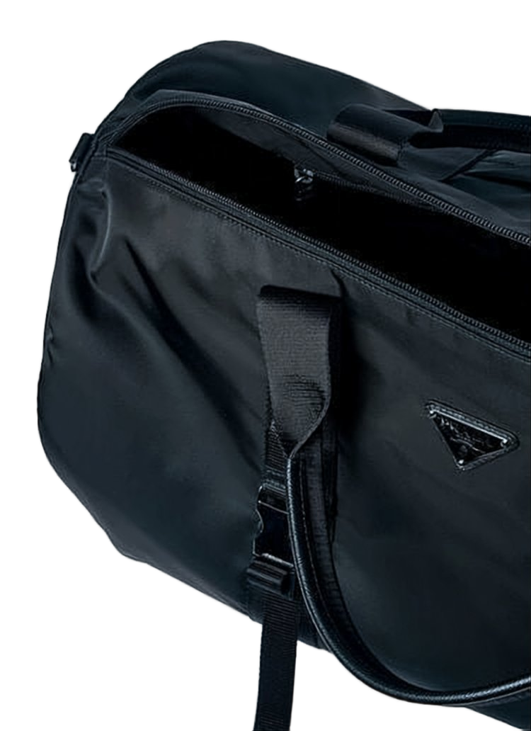 Sleek Cylindrical Crossbody Bag with Detachable Strap