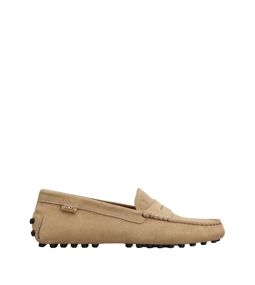 Classic Brown Leather Moccasins With Distinctive Detailing