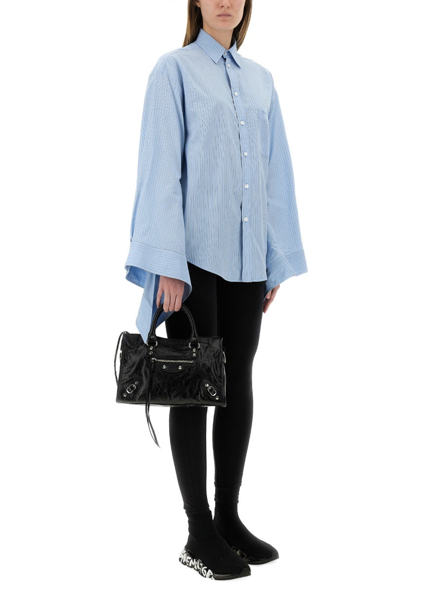 Blouse with Unique Knotted Cuffs and Refined Silhouette