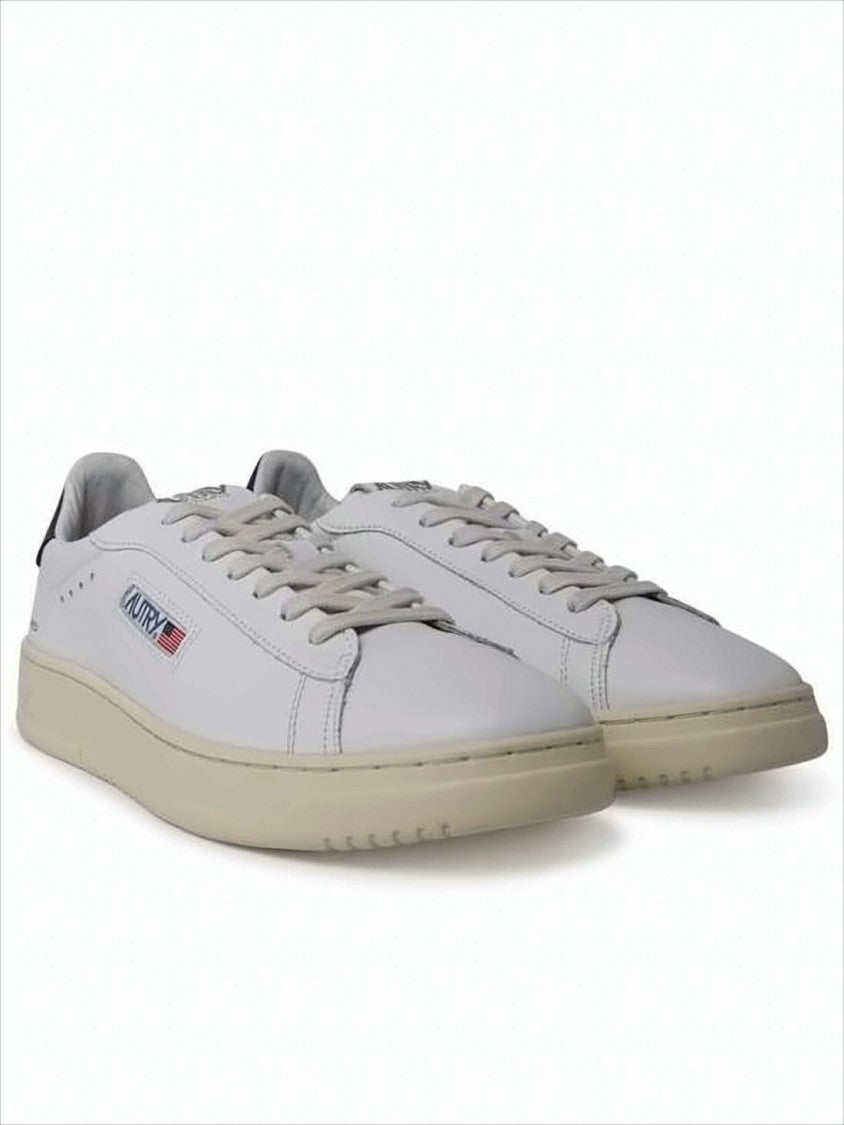 Low-Top White Leather Sneakers with Perforated Detailing
