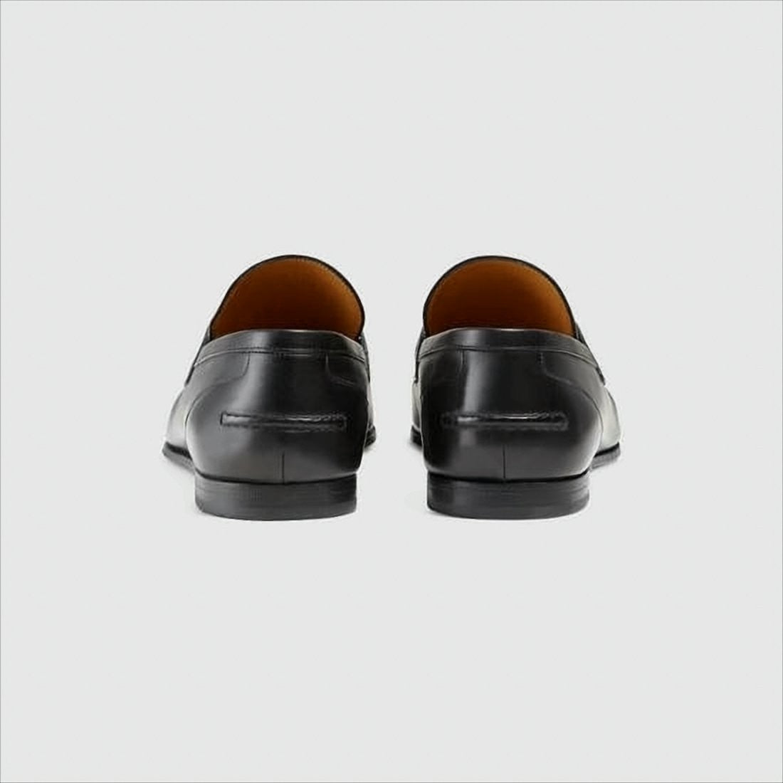 Black Leather Loafers with Gold Horsebit Detail