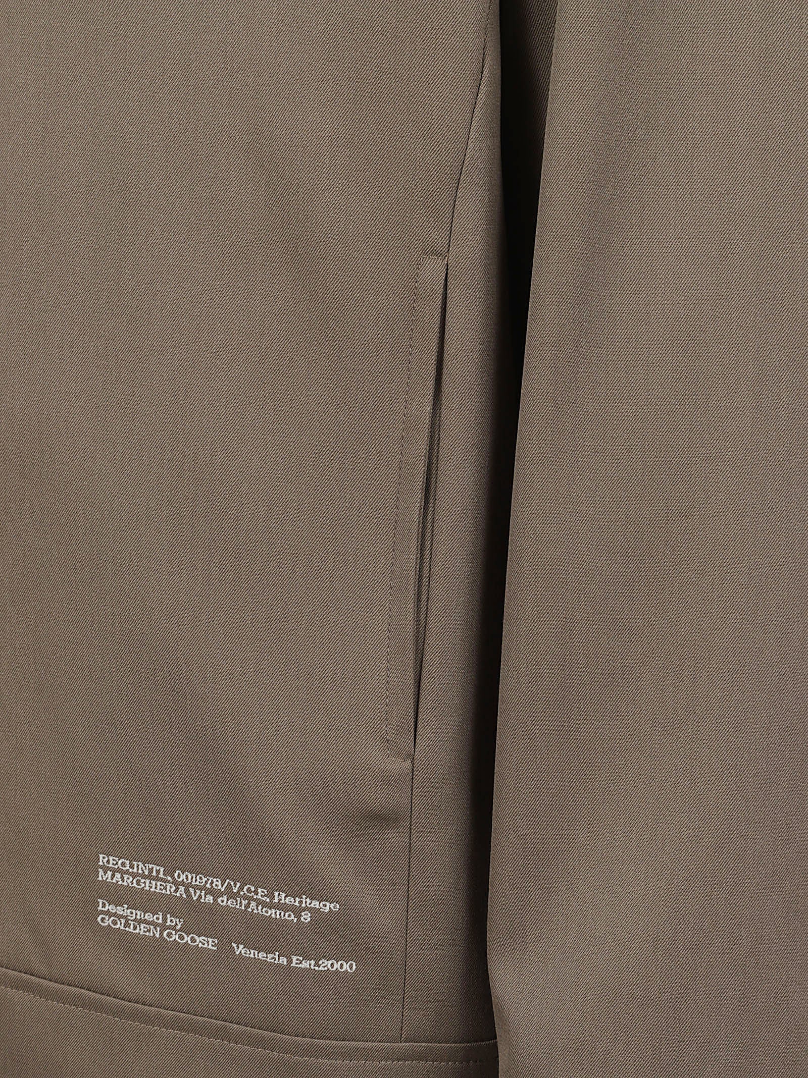 Brown Jacket with Pointed Collar and Star Embellishments